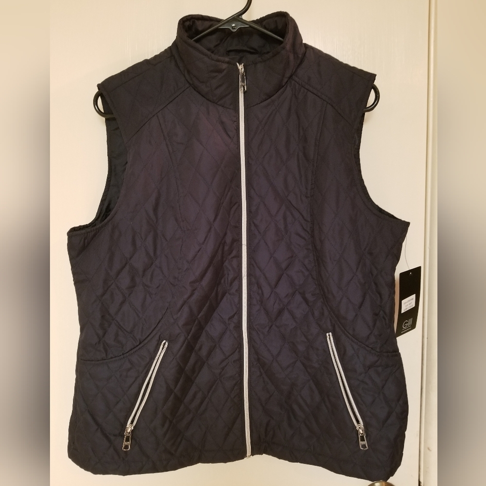 Women's Navy Blue Quilted Vest. Women's  size large. Brand new with tags.